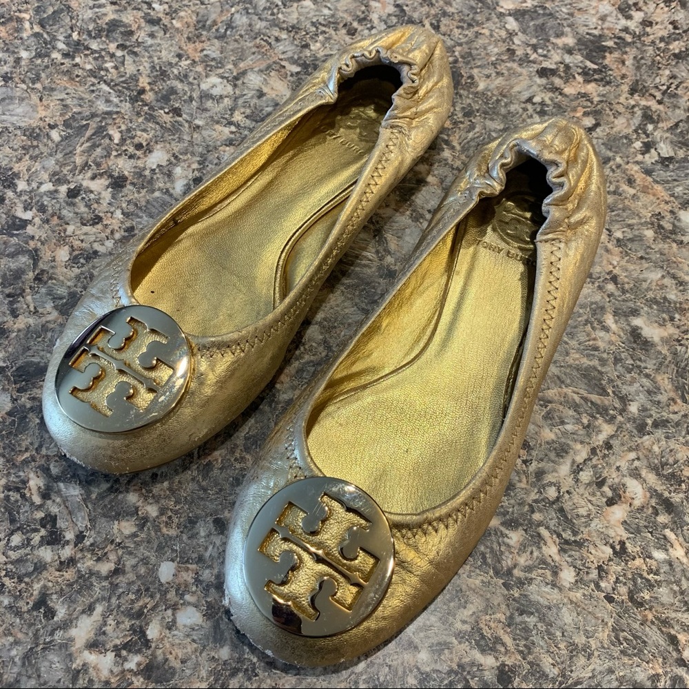 Tory Burch gold flats Size 6.